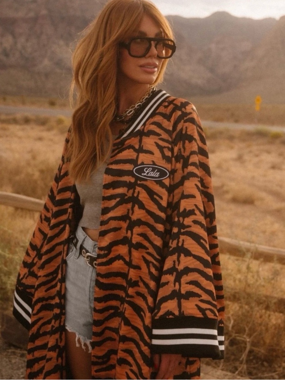 Dressed in LALA Orange & Black Tiger-Print kimono